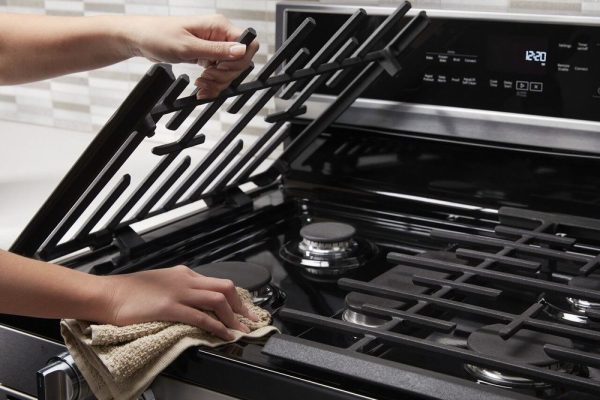 how-to-get-grease-off-your-stove-top-1695619103 how-to-get-grease-off-your-stove-top-1695619103